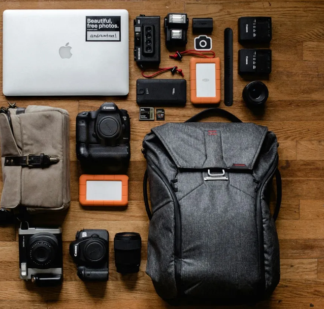 fully packed back pack with all camera accessories