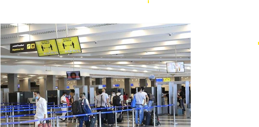 International travelers arriving at Cairo International Airport and preparing to complete immigration procedures for entry into Egypt.