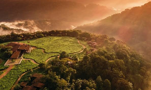 remote hillside lodge Rwanda thousand hills landscape