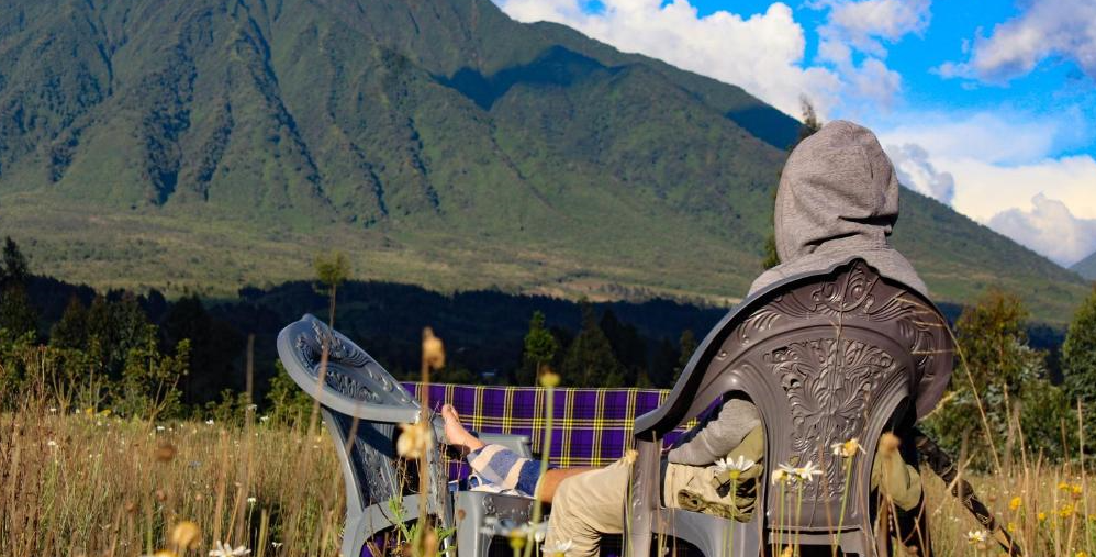 traveler viewing the mountain ranges