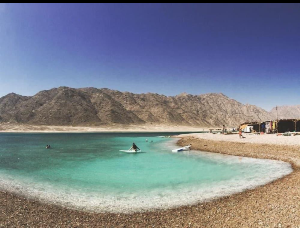 Nuweiba beach Egypt with turquoise Red Sea water and desert mountains