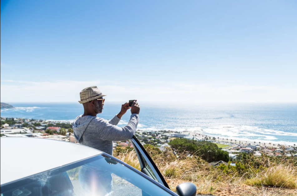 Cape Town Table Mountain with a South African safari vehicle and African wildlife. Cape Town and South Africa safari travel experience with wildlife and Table Mountain