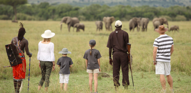 a family on safari in kenya