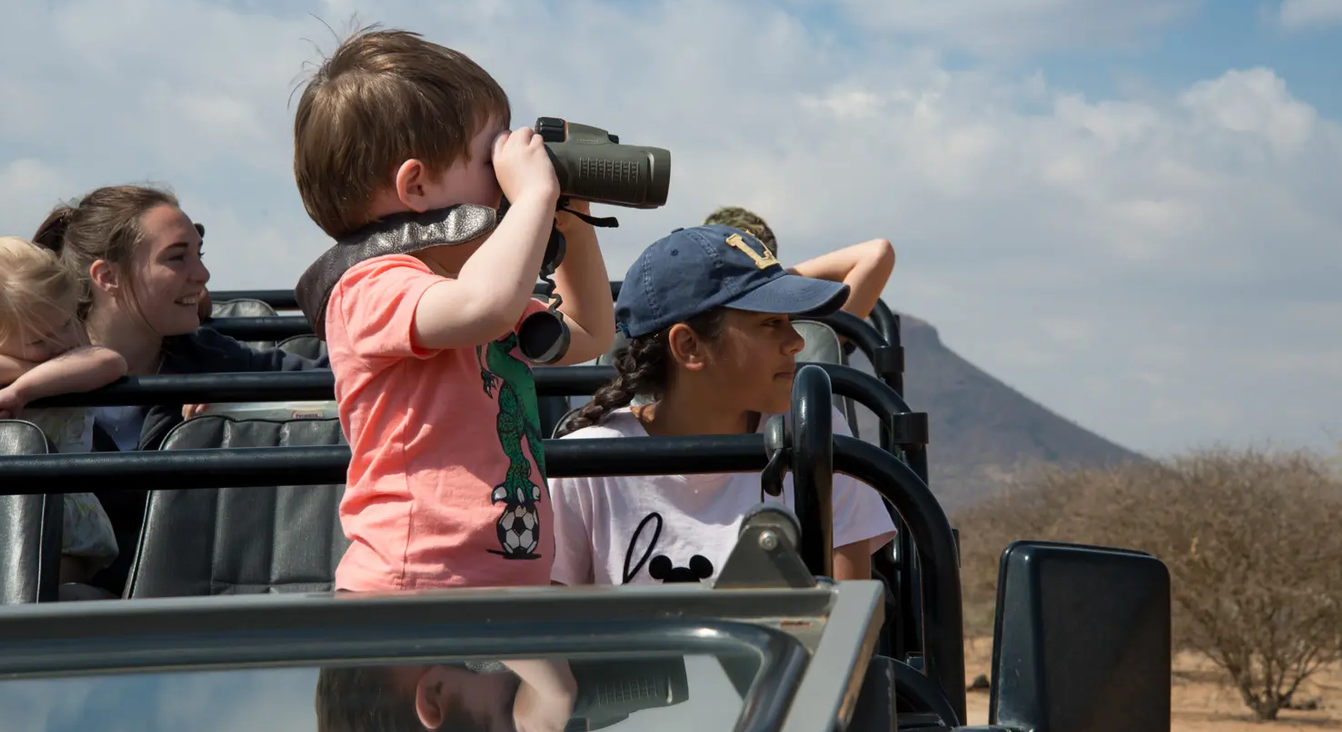kids and parents on safari